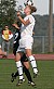 Liz Petersen heads the ball for Gustavus.