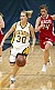Emily Nelson pushes the ball up the floor in the second half.