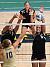 Senior Britta Bolm and sophomore Nicki Ainsworth team up for a block.
