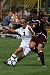Mackenzie Del Santro protects the ball from a UM-Morris defender.