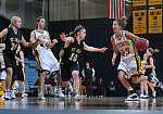 Molly Geske brings the ball up the floor.  (Photo by Brian Fowler, SportPix)
