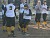 Audrey Lenoch touches home plate after drilling a home run over the right field fence in game one.