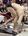 A Gustie swimmer gets set to start.