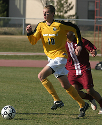Flynn Stewart-Franzen pushes the ball up the field.