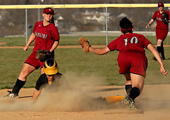 Emily Klein steals a base in the Gusties 6-0 win in game two.