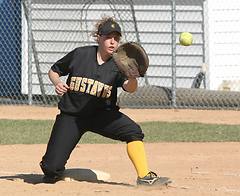 Tina Strauss stretches to make the out at first for the Gusties